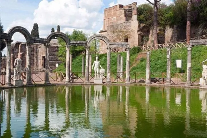 Small group exploring Villa Adriana ruins on a premium half day Tivoli tour from Rome, Italy
