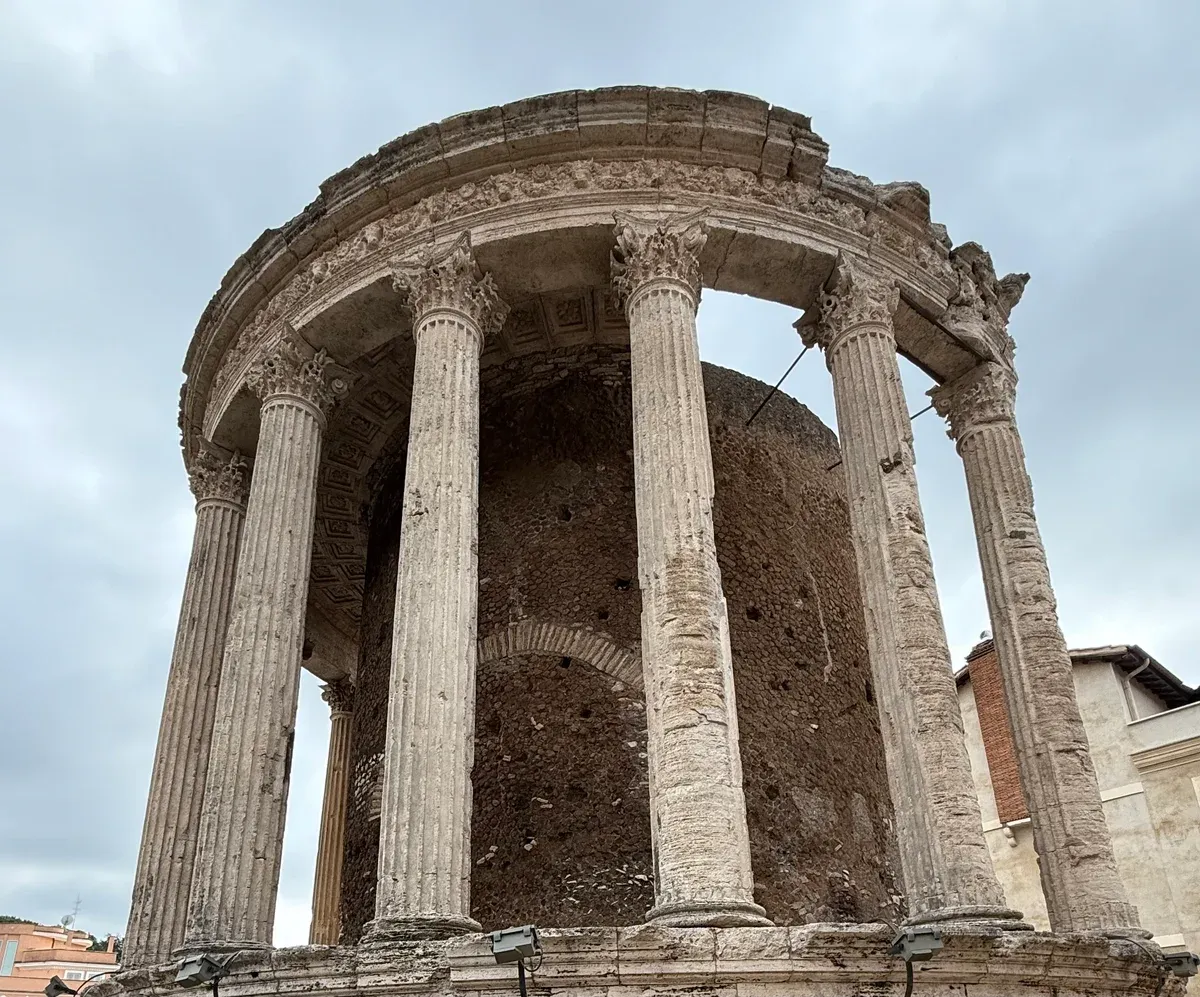 The round Temple of Vesta on the acropolis of Tivoli above the gorge, a free viewpoint on a Tivoli day trip from Rome